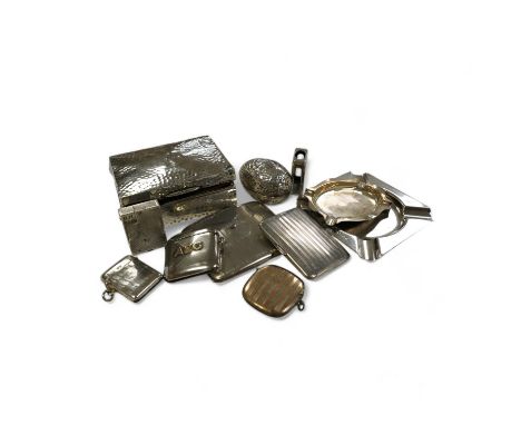 Eleven smoking related items including four silver vesta cases, one egg shaped, two silver ashtrays, two silver cigarette cas