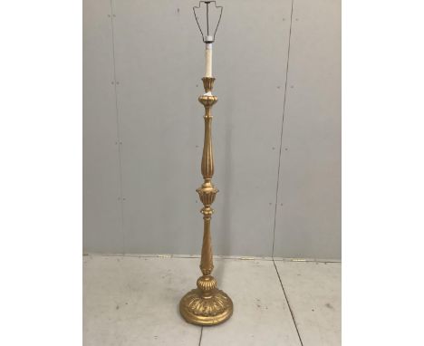 A carved giltwood standard lamp, height including shade 174cm. Condition - fair