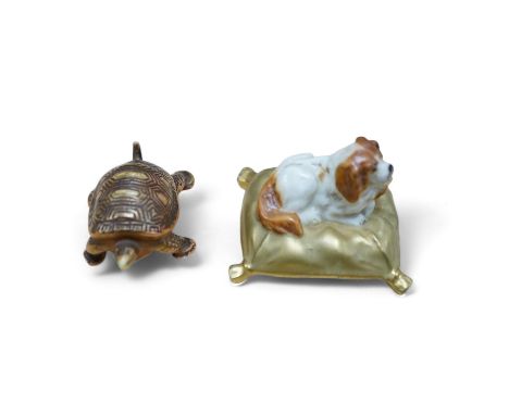 An unusual Royal Worcester miniature King Charles Spaniel sitting on cushion and tortoise, 4cm wide. Condition - fair