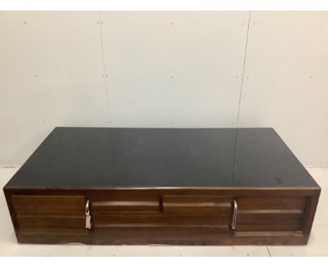 A Betty Joel satin mahogany glass top sofa table, width 196cm, depth 96cm, height 46cm. Condition - good