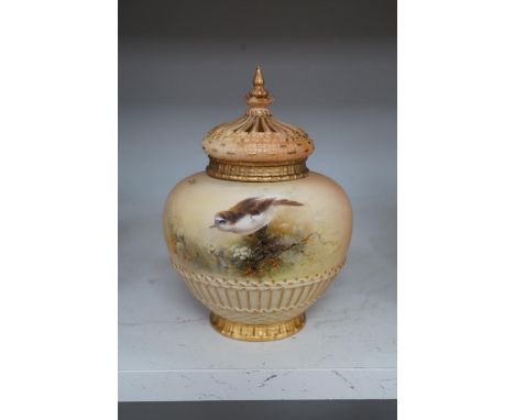 A Royal Worcester bird painted pot pourri and cover, painted by E. Barker, model number 1286, 19cm. Condition - good