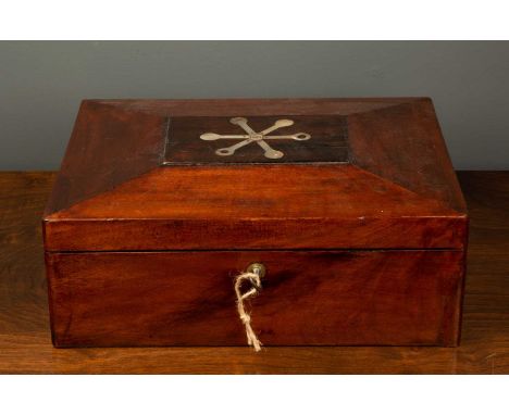 A Victorian mahogany cased games box with mother of pearl inlay and etched date 1882 to the top, the lift top revealing lift 