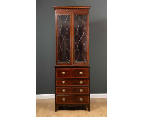 A 19th century mahogany and stainwood inlaid secretaire bookcase with twin astragal glazed doors above secretaire drawer and 