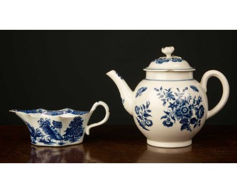 An 18th century Worcester globular teapot and cover with a three flower pattern, 15cm high and an unusual 18th century Englis