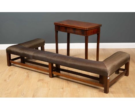 A 19th century mahogany fold over tea table 75cm wide x 37cm deep x 71cm high together with an upholstered club fender, 189cm