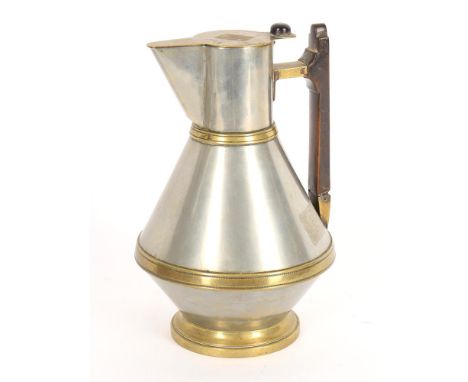 
	
		A small claret jug attributed to Christopher Dresser for Richard Perry, Son &amp; Co., Wolverhampton, brass, plate and s