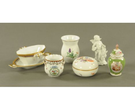 Six continental porcelain items including Dresden design cherub, Vienna style lidded vase, Venetian sauce boat, Dresden style