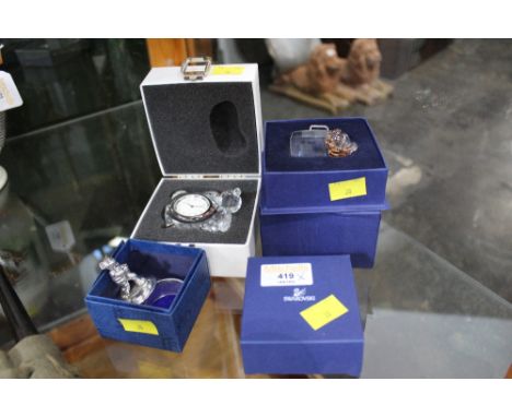 Selection of Swarovski Crystal bears, mantle clock etc 