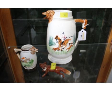 Beswick fox ornament and a large and small hunting patterned jug  