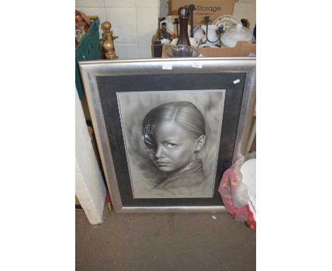 ABSTRACT PRINT OF A FEMALE FIGURE SET IN A SILVERED FINISH FRAME 