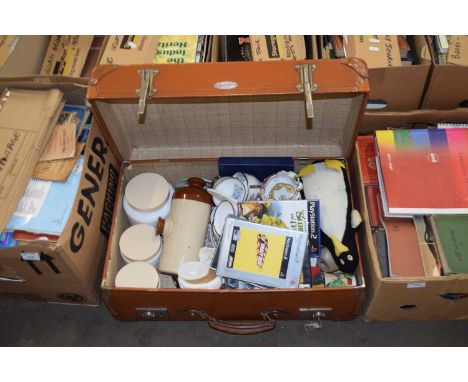 Vintage suitcase containing various assorted teawares, ornaments and Playstation games