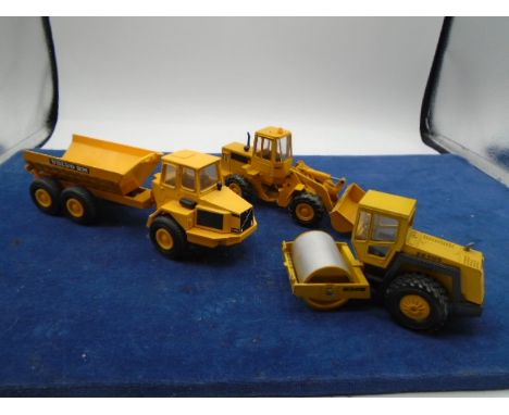 CONRAD cat loader model 2886, CONRAD road roller BW213D model 2710, Volvo BM 5350 dumper. no boxes