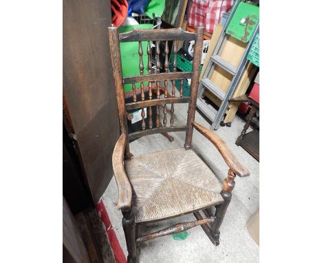 Rush seat stick back rocking chair