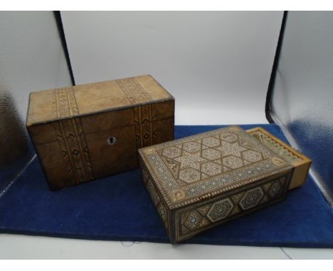 Edwardian, mahogonyTea caddy with mother of pearl escutcheon and cigarette box with secret draw, in marquetry but pieces miss