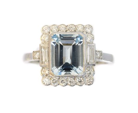 An aquamarine and diamond cluster ring,  An aquamarine and diamond cluster ring, the rectangular shape aquamarine weighing ap