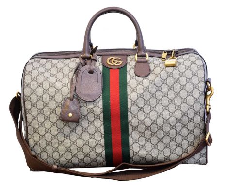 A Gucci Ophidia Monogrammed Holdall Bag,  A Gucci Ophidia Monogrammed Holdall Bag, the maker's monogram and brown leather ext