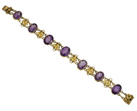 An early 20th century amethyst bracelet,  An early 20th century amethyst bracelet, the oval shape amethyst line with foliate 