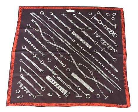 A Hermès 'Chaines & Gourmettes' silk scarf,   A Hermès 'Chaines & Gourmettes' silk scarf, the brown and terracotta ground dep