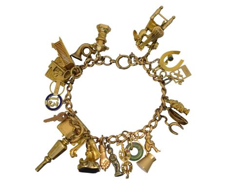 A charm bracelet,  A charm bracelet, the flat curb link chain stamped 9ct suspending twenty five charms to include a jade bi,