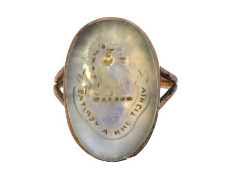 A moonstone intaglio ring, A moonstone intaglio ring, the oval moonstone cabochon engraved with the intaglio 'vincit omnia ve
