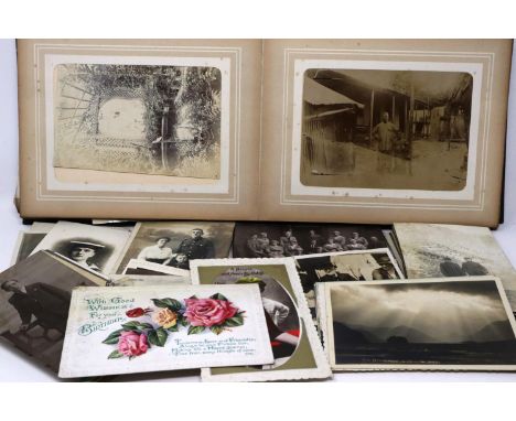 Collection of Edwardian and WWI period portrait photographs, including military subjects, with postcards and an album of ship