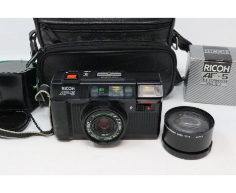 Ricoh AF-5 camera and a quantity of film. UK P&amp;P Group 2 (£20+VAT for the first lot and £4+VAT for subsequent lots) 