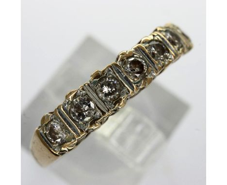 9ct gold ring set with seven diamonds, size L/M, 2.1g. UK P&amp;P Group 1 (£16+VAT for the first lot and £2+VAT for subsequen