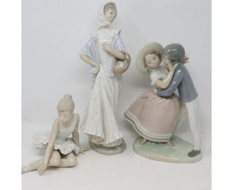 Lladro figurine, Waltz Time, and two Nao figurines, largest H: 33 cm, flea bites to two figurines. UK P&amp;P Group 3 (£30+VA