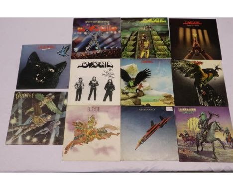 Eleven Budgie albums: Budgie, 12 Inch Single, Squawk, Never Turn Your Back on a Friend, In For the Kill, Bandolier, If I Were