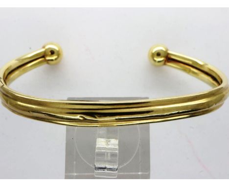 9ct gold torque bangle, slightly misshapen and dented, D: 70 mm, 5.6g. UK P&amp;P Group 1 (£16+VAT for the first lot and £2+V