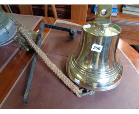 Large Brass Ships Bell marked G R Reign with rope gong and Cast Iron Bracket
