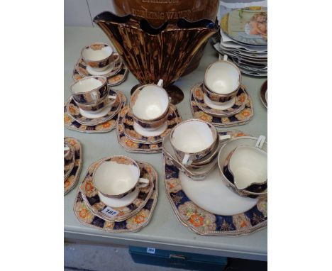 Edwardian H & K Transfer printed gilded teaset with floral decoration and a Beswick gilded vase