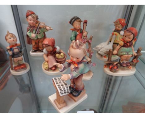 Set of 8 Hummel figurines inc. Chick Girl, Little Hiker, Band Leader etc.