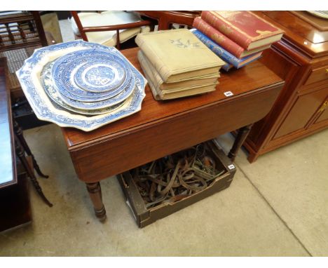 Victorian Mahogany Drop leaf table on turned supports and brass casters