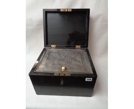 A Large Chinese Cantonese Black Lacquered tobacco caddy C.1840 with rectangular Pewter liner the hinged lid engraved with typ