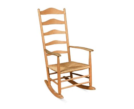 Neville Neal, an ash ladder back rocking chair,  after the original design by Ernest Gimson, stamped 106 x 52 x 67cmIn good o