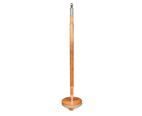 An Art Deco chrome mounted standard lamp,  the swollen cylindrical column with chrome rings and ends to a circular base on th