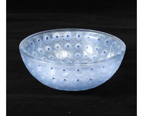 Nemours, an R. Lalique frosted and polished glass bowl heightened in blue, the moulded concentric rows of stylized flowerhead