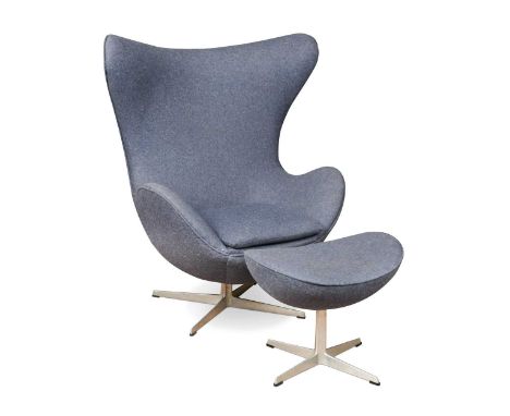 Arne Jacobsen for Fritz Hansen, an Egg chair and stool, with original blue upholstery, stamped to undersidethe chair 107 x 92