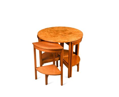 An Art Deco nest of walnut occasional tables, the main table with well figured, quarter-veneered burr-walnut top raised over 