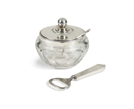 Harald Nielsen for Georg Jensen (1866-1935), a silver mounted preserve pot and spoon, pattern no. 600,  the faceted glass bod