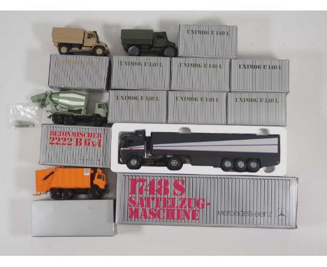 A group of NZG for Mercedes Benz diecast 1:50 scale trucks including various Unimogs - VG/E in VG boxes (11)
