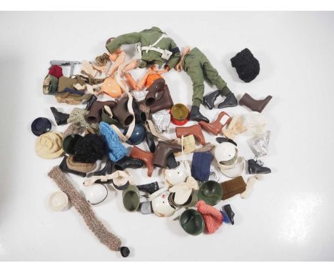 A quantity of PALITOY Action Man accessories to include helmets, boots, various body parts etc - F/G unboxed (Q)
