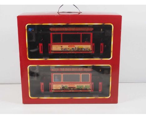An LGB G Scale twin tram car and trailer set - limited edition produced in 1988 to celebrate 20 years of LGB Trains - unseale