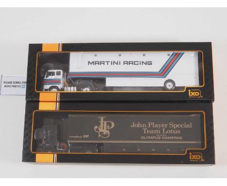 A pair of IXO 1:43 scale Volvo racing team articulated transporter lorries, comprising an example in Martini Racing livery an