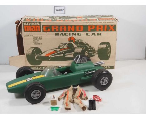 A scarce PALITOY Action Man Grand Prix Racing Car, circa 1970-1972, in original box, missing side numbers, and some damage to