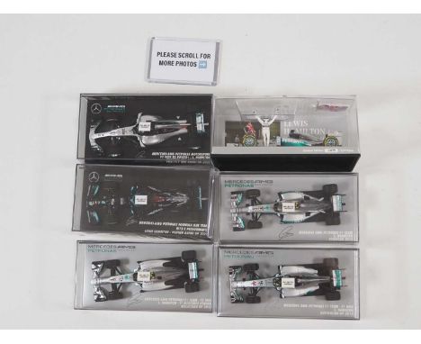A group of MINICHAMPS 1:43 scale Mercedes Formula 1 cars, all representing cars driven by Lewis Hamilton 2013-2021 - VG/E in 