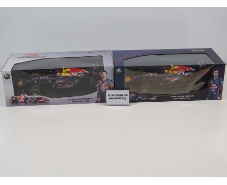 A pair of MINICHAMPS 1:18 scale Red Bull Racing Formula 1 cars, both Mark Webber examples, 2012/2013 cars - VG/E in G/VG boxe