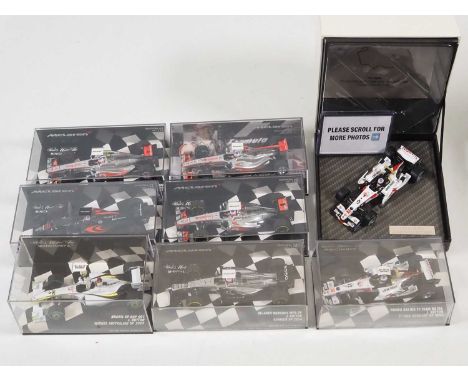 A group of MINICHAMPS and HONDA RACING TEAM 1:43 scale Formula 1 cars, all representing cars driven by Jenson Button - VG/E i