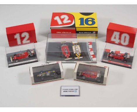 A group of BRUMM 1:43 scale Formula 1 race cars, all 1970s era, including a twin pack, one individual car #12 with damage to 